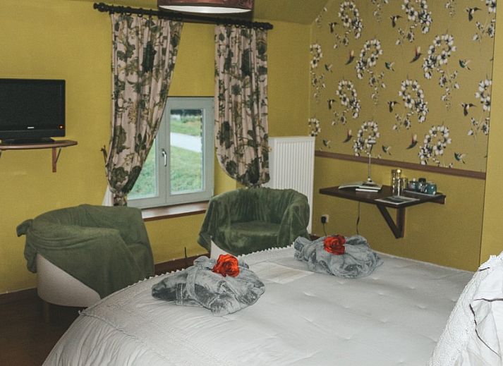 Gezellige entree van Hoeve Westdijk bed and breakfast in Brugge, gelegen aan een charmante weg in West-Vlaanderen.