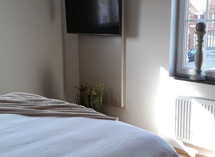 Gezellig terras bij Valant B&B in Brugge, West-Vlaanderen, ideaal voor ontspannen momenten.