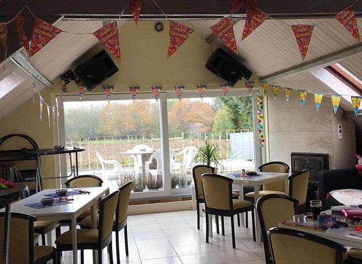 Eingangsschild von Aalsters Genot, einer charmanten Fruehstueckspension in Aalst, Ostflandern, mit Kontaktinformationen.