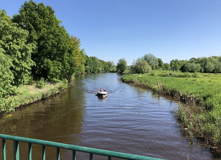 Comfortable bedroom in B&B 't Mjeels Pierke, Meerle, Antwerp with TV and closet.