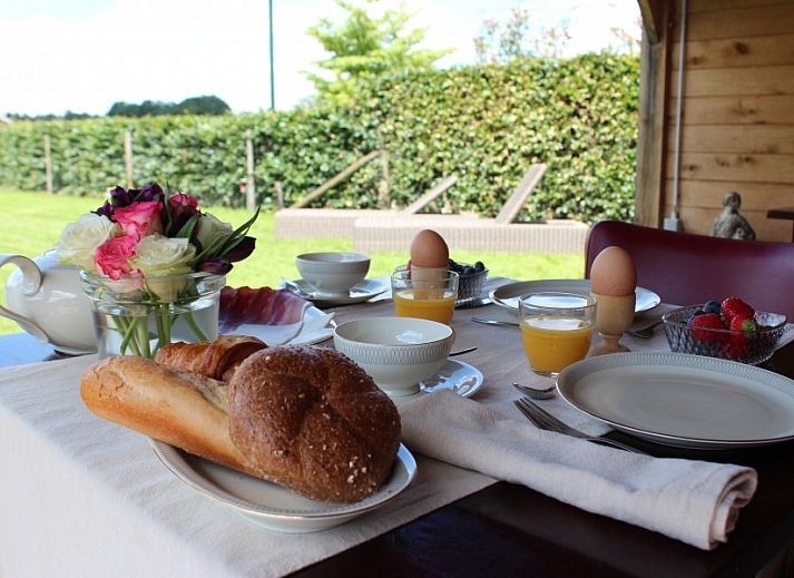 Stylish bedroom with double bed in B&B 't Mjeels Pierke, Meerle, Antwerp.