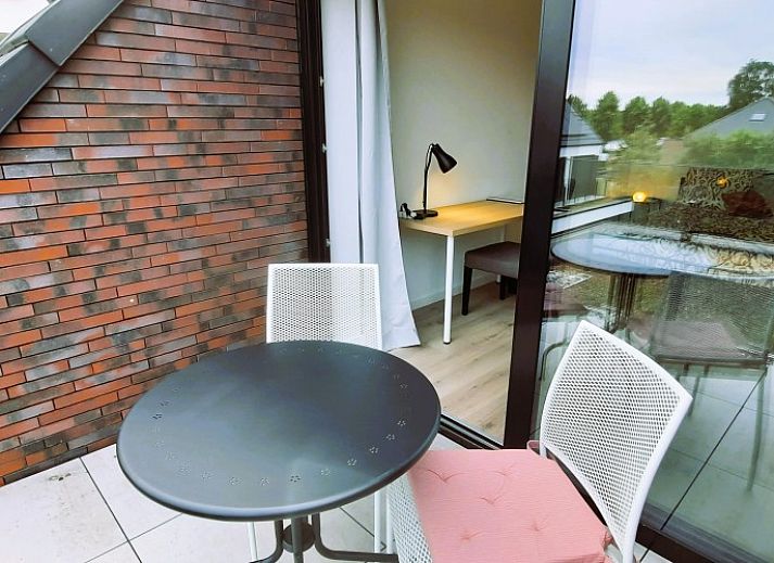 Geniessen Sie den Garten und die Terrasse des B & B Waterzicht in Wijnegem, einem entspannenden Bed & Breakfast in Antwerpen.