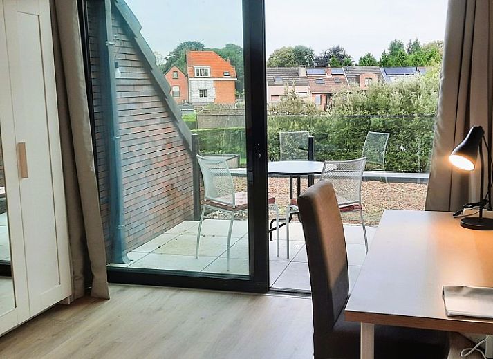 Geniessen Sie den Garten und die Terrasse des B & B Waterzicht in Wijnegem, einem entspannenden Bed & Breakfast in Antwerpen.