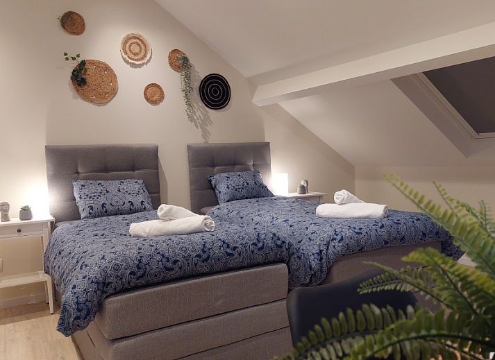 Cozy dining area in B&B Viator Tongeren, Belgium with inviting atmosphere and modern decor.