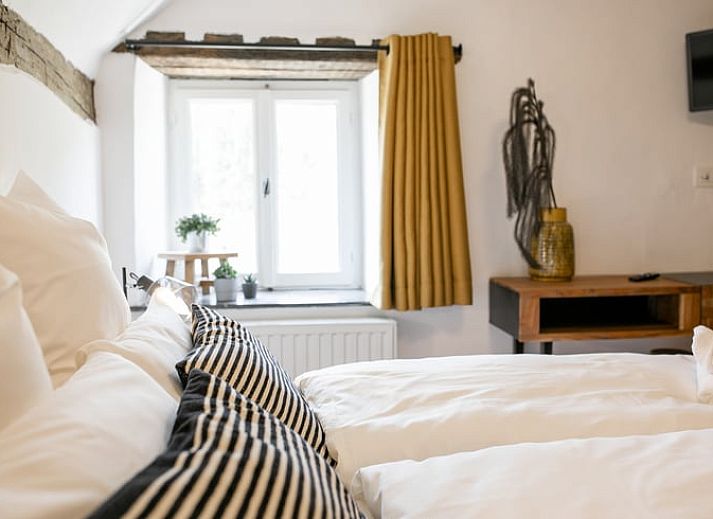 Uitgebreid ontbijtbuffet met vers fruit en broodjes in Vakantiehuisje in Stoumont, Ardennen.