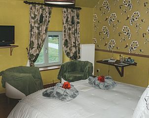 Comfortabele slaapkamer in Hoeve Westdijk bed and breakfast, Brugge, met gezellige inrichting in West-Vlaanderen.