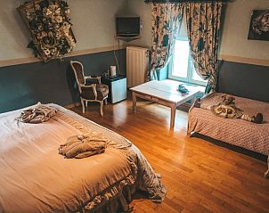 Gezellige familiekamer in Hoeve Westdijk bed and breakfast, Brugge, met warme inrichting in West-Vlaanderen.