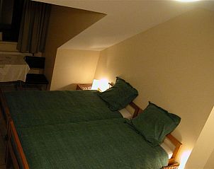 Gezellige slaapkamer in 't Regulierenhuisje, een bed and breakfast in Tongeren, Limburg, Belgi, voor een ontspannen verblijf.