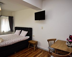 Slaapkamer met zithoek in B&B De Bloesem in Tongeren, Limburg, Belgi, bed and breakfast.